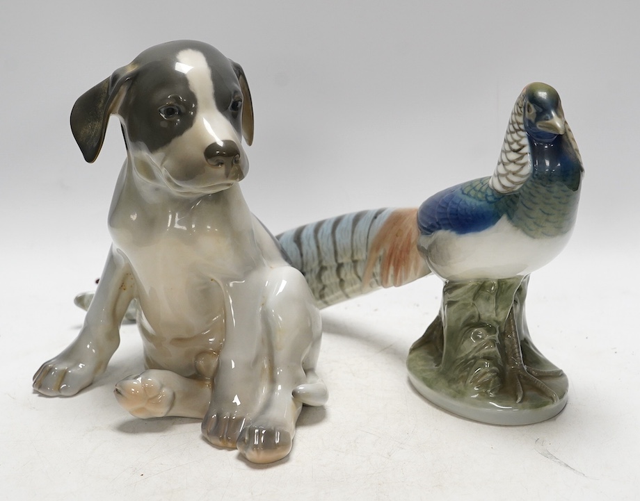 A Royal Copenhagen puppy, 20cm high, and a pheasant. Condition - good